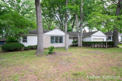 Photo of 297 Fourth Avenue, Holland Charter Township, MI 49424 (MLS # 65026030449)