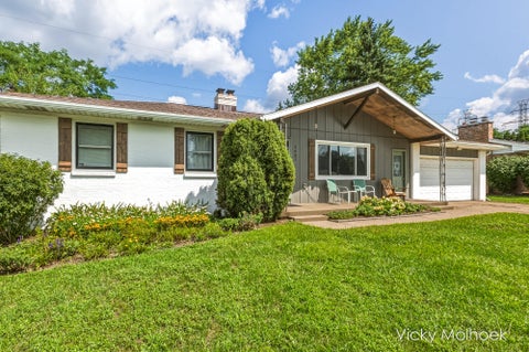 Photo of 1651 Sunny Creek Street SE, Kentwood City, MI 49508 (MLS # 65026045877)