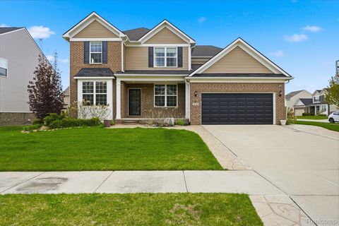 Photo of 16308 Adelaide Drive, Macomb Township, MI 48044 (MLS # 20261030828)