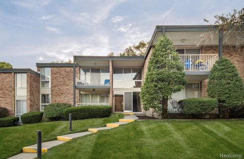 Photo of 4049 W Maple Road #A205, Bloomfield Hills City, MI 48301 (MLS # 20251043163)