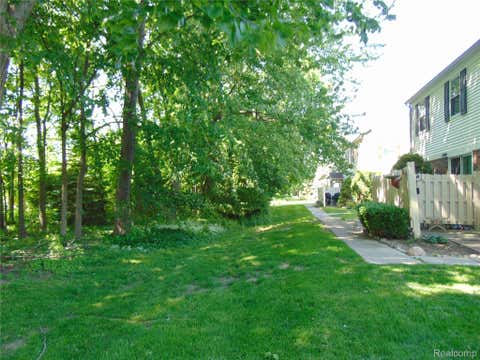 Tiny photo for 44167 Providence Drive #326, Clinton Charter Township, MI 48038 (MLS # 20261046683)