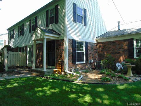 Tiny photo for 44167 Providence Drive #326, Clinton Charter Township, MI 48038 (MLS # 20261046683)