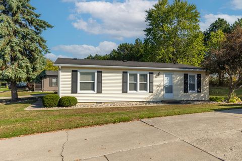 Photo of 317 Cadgewith East, Dewitt Charter Township, MI 48906 (MLS # 65025051297)