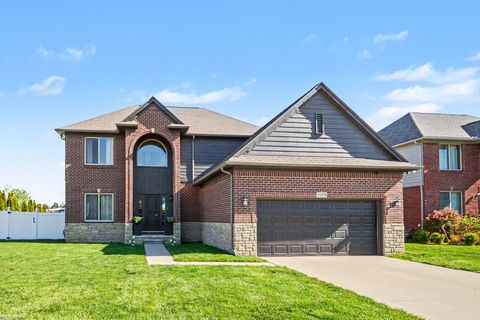 Photo of 31078 Lions Pointe Drive, Chesterfield Township, MI 48047 (MLS # 58050207292)