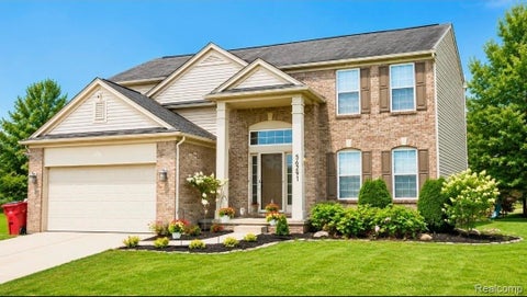 Photo of 56291 HASTINGS Dr, Macomb Township, MI 48042 (MLS # 20261057937)