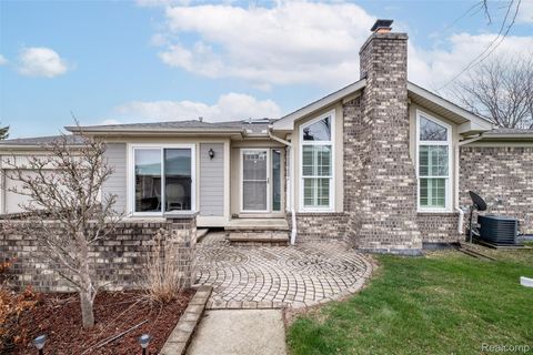 Photo of 18040 Port Salem Drive #17, Macomb Township, MI 48044 (MLS # 20261023579)