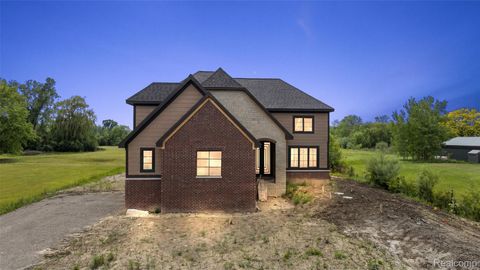 Photo of 60637 Schoenherr Rd, Washington Township, MI 48094 (MLS # 20261037500)