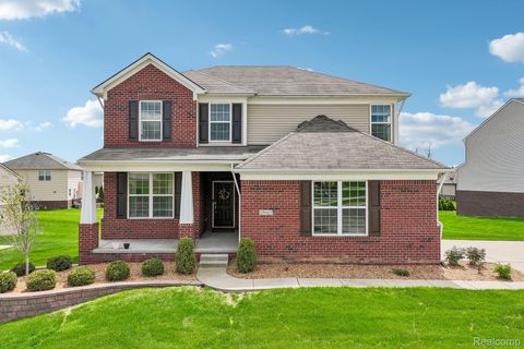 Photo of 29831 Braeburn dr, Lyon Charter Township, MI 48165 (MLS # 20261028144)