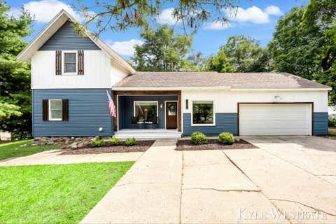 Photo of 315 N Bridge Street, Belding City, MI 48809 (MLS # 65026044042)