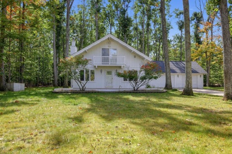 Photo of 635 Michaywe Drive, Otsego Lake Township, MI 49735 (MLS # 81026052375)