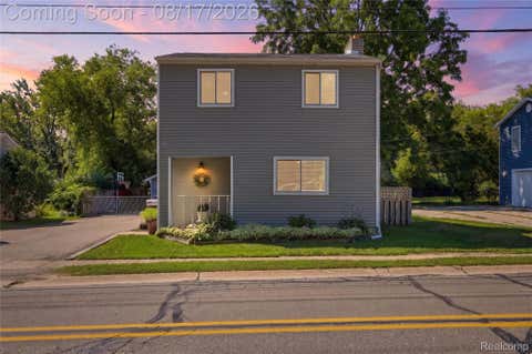 Photo of 572 Atwater Street, Lake Orion Village, MI 48362 (MLS # 20261061965)