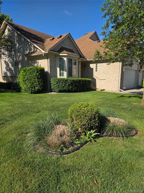 Photo of 30118 Indianwood Drive, Chesterfield Township, MI 48047 (MLS # 20261039674)