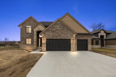 Photo of 50386 Mistwood Drive, Macomb Township, MI 48042 (MLS # 20261000240)