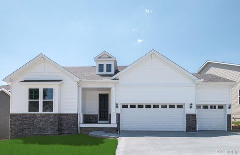 Photo of 50632 Crusader Drive, Macomb Township, MI 48042 (MLS # 20261025114)