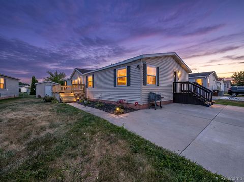 Photo of 938 Tanner Landing, Raisinville Township, MI 48161 (MLS # 20261057718)