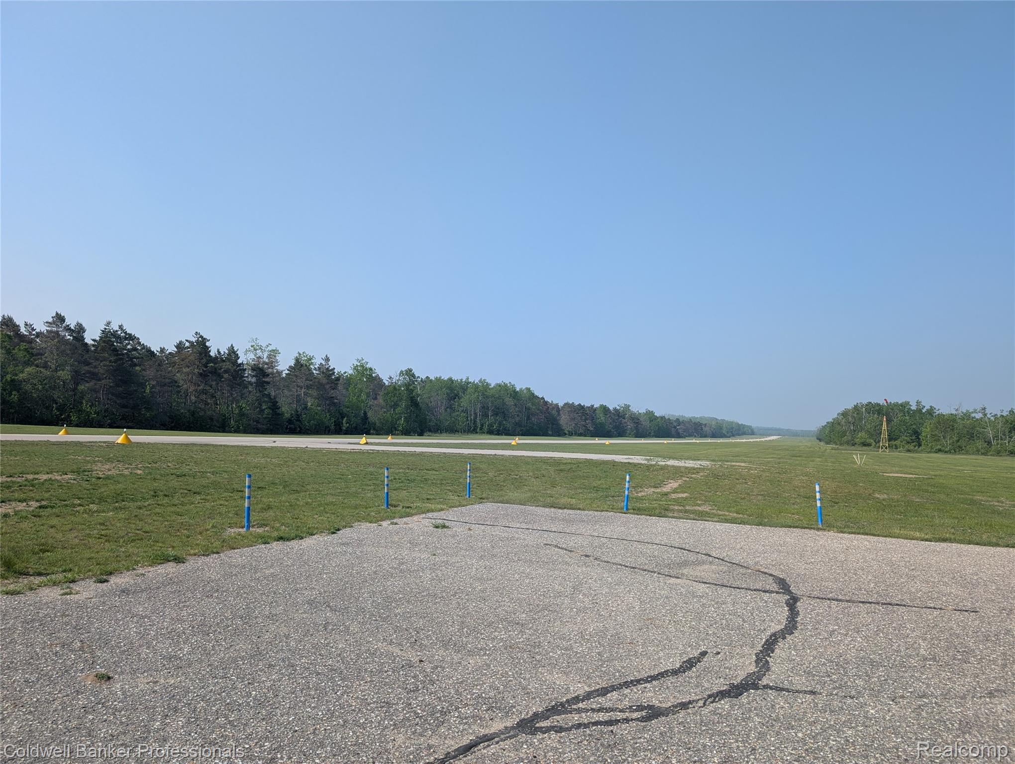 this parcel buts up to the airstrip at Lakes of the North
