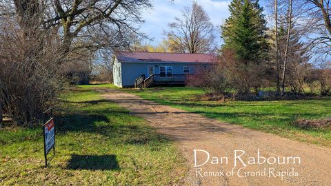 Photo of 1185 11 Mile Road, Wheatland Township, MI 49340 (MLS # 65026015560)