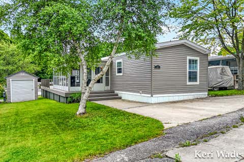Photo of 6100 N Beaune Road #40, Hamlin Township, MI 49431 (MLS # 71026032476)
