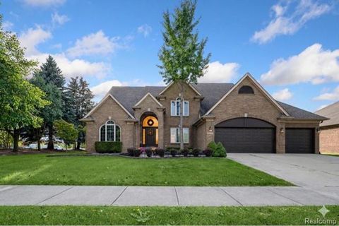Photo of 45021 Riverwoods Drive, Macomb Township, MI 48044 (MLS # 20261028973)