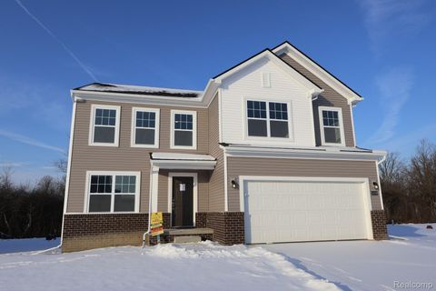 Photo of 54789 Mockingbird Dr, Chesterfield Township, MI 48047 (MLS # 20261003075)