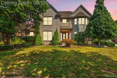 Photo of 48802 Crescent Drive, Macomb Township, MI 48044 (MLS # 20261068534)
