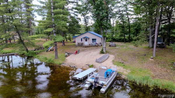 8272 PARADISE DR, SOUTH BRANCH, MI 48761 - Image 493c7a3fec2cda2a7630429b3e1d2ada/1426763091