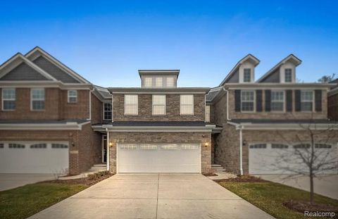 Photo of 40111 Premier Drive #21, Northville Township, MI 48170 (MLS # 20261018156)