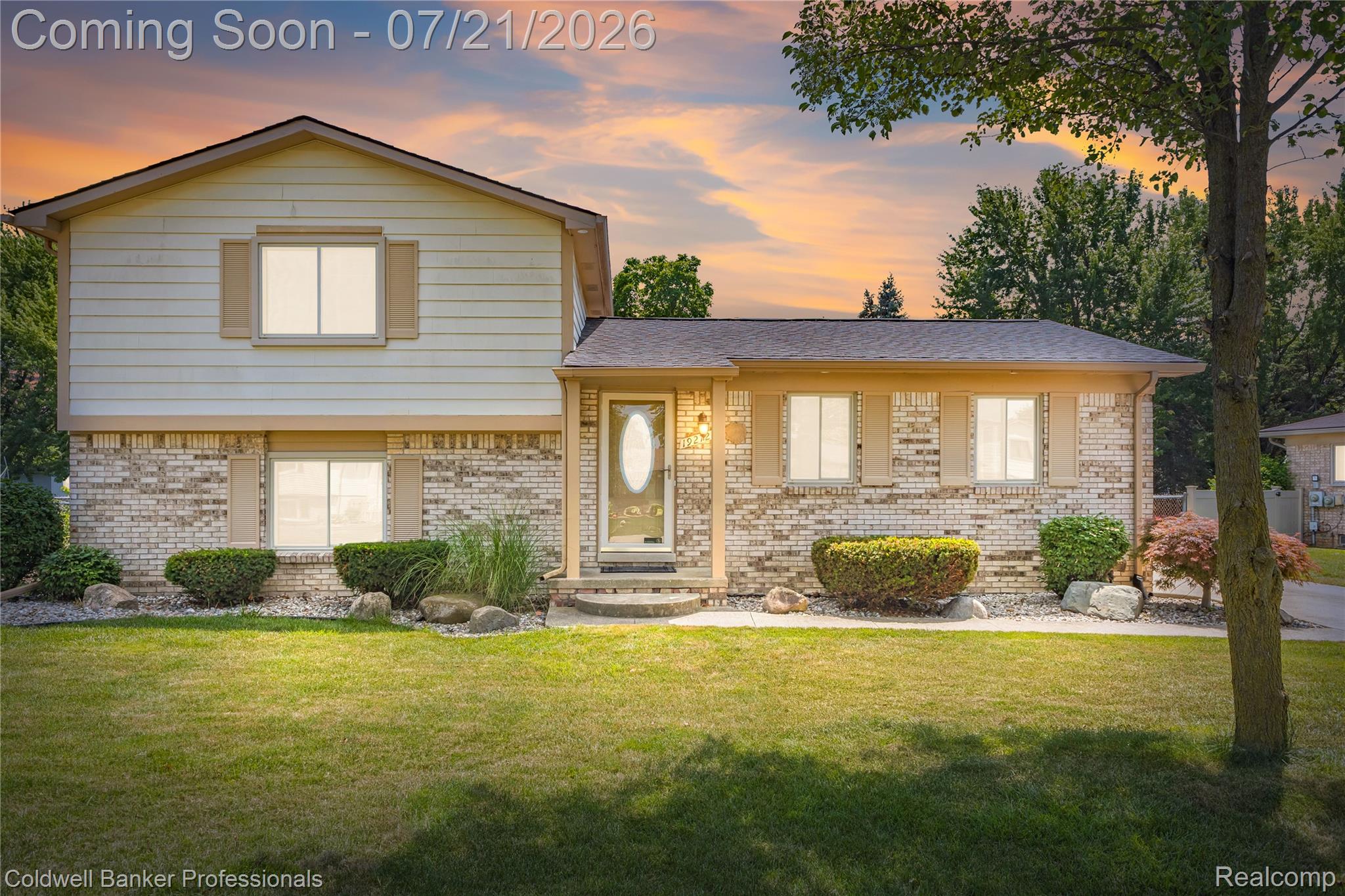 Two-story home with brick and siding exterior
