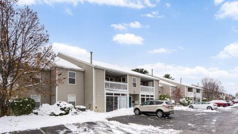 Photo of 3151 Poplar Creek Drive SE #104, Kentwood City, MI 49512 (MLS # 65026016664)