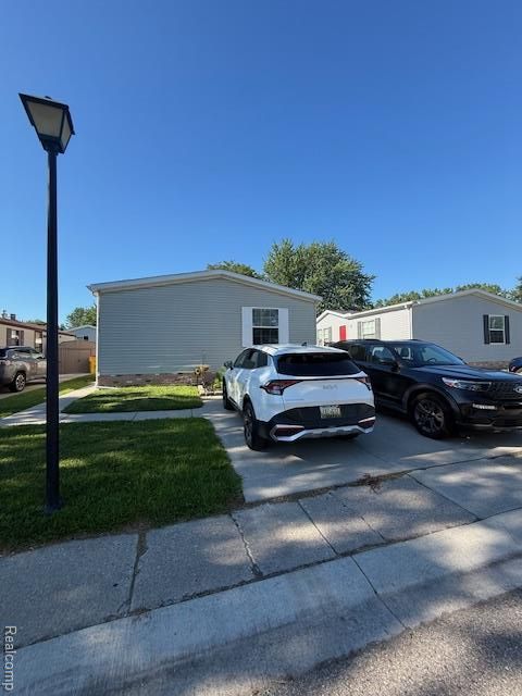 Photo of 17115 Scarborough Drive, Macomb Township, MI 48044 (MLS # 20251019310)