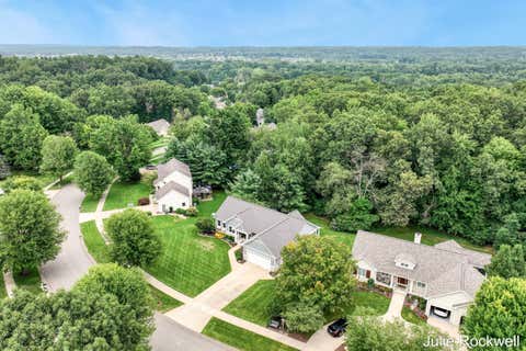 Photo of 4730 Sundial Drive NE, Plainfield Charter Township, MI 49525 (MLS # 65026042959)