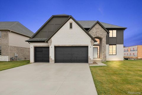 Photo of 50669 Mistwood Drive, Macomb Township, MI 48042 (MLS # 20251047171)