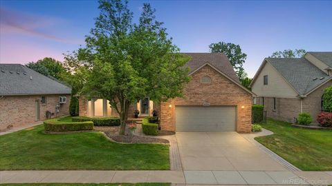 Photo of 54764 Malheur Drive, Macomb Township, MI 48042 (MLS # 58050210997)