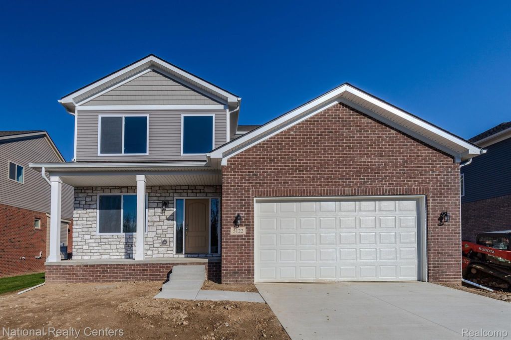 Photo of 53188 Woodland Meadows Drive, Chesterfield Township, MI 48047 (MLS # 20261042034)