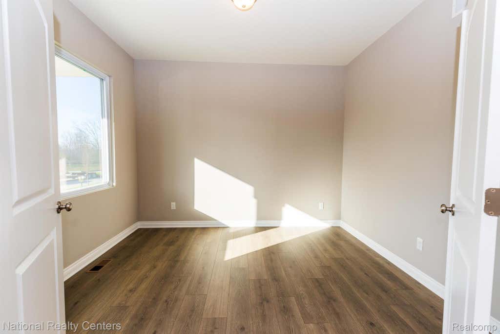 Photo of 53188 Woodland Meadows Drive, Chesterfield Township, MI 48047 (MLS # 20261042034)