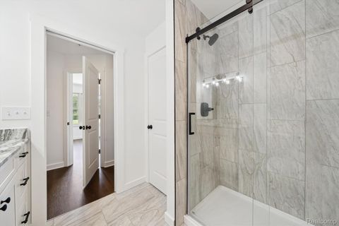 Tiny photo for 431 Village Drive #188, Walled Lake City, MI 48390 (MLS # 20261003048)