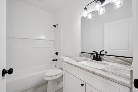 Tiny photo for 431 Village Drive #188, Walled Lake City, MI 48390 (MLS # 20261003048)