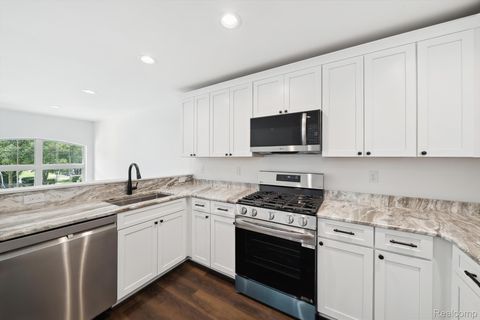 Tiny photo for 431 Village Drive #188, Walled Lake City, MI 48390 (MLS # 20261003048)