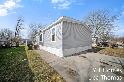 Photo of 6187 Fordwick Drive SE, Grand Rapids City, MI 49548 (MLS # 65026006204)