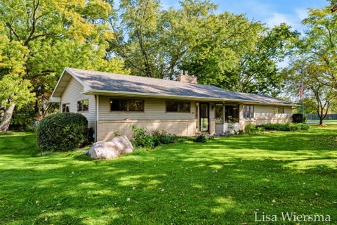 Photo of 1423 Leonard Street NW, Tallmadge Charter Township, MI 49534 (MLS # 65026054512)