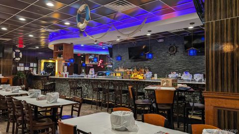 32821 GRAND RIVER Avenue Farmington City MI 48336