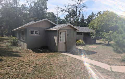 Photo of 580 W 11 Mile Road, Eden Township, MI 49644 (MLS # 71026043900)