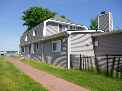 Photo of 1704 Cass Lake Front Road, Keego Harbor City, MI 48320 (MLS # 58050196108)