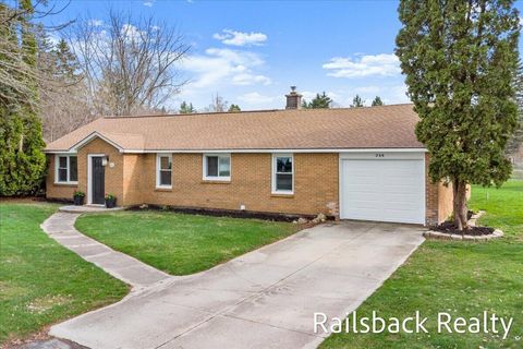 Photo of 266 Ronald Street NE, Cedar Springs City, MI 49319 (MLS # 65026015268)