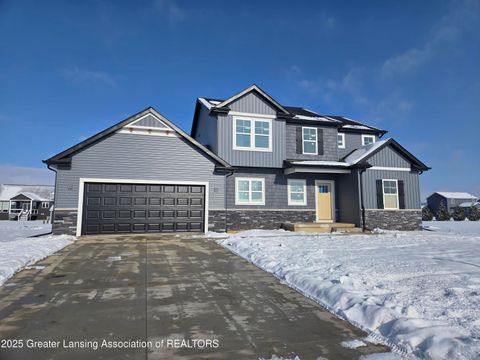 Photo of 2320 Secretariat Lane, Bingham Township, MI 48879 (MLS # 55026018353)