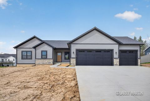Photo of 1845 Stratford Lane NW, Walker City, MI 49534 (MLS # 65026018759)