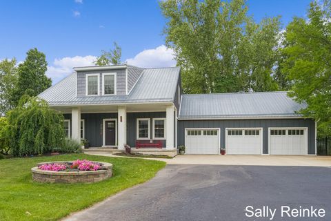Photo of 303 Broman Street NE, Algoma Township, MI 49345 (MLS # 65025042575)