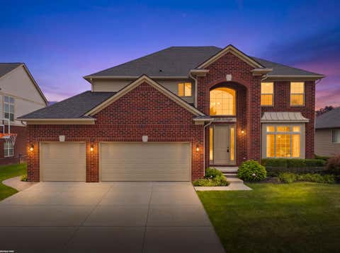 Photo of 55300 Azinger Drive, Macomb Township, MI 48042 (MLS # 58050218699)