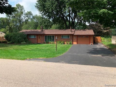Photo of 1693 Ashstan Drive, Walled Lake City, MI 48390 (MLS # 20261029709)