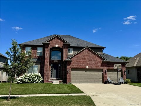 Photo of 50216 Ashperton Drive, Macomb Township, MI 48044 (MLS # 20261028152)